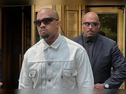 Ye, the rapper formerly known as Kanye West, leaves federal court during the trial of Sean "Diddy" Combs in New York, Friday, June 13, 2025. (AP Photo/Michael R. Sisak)