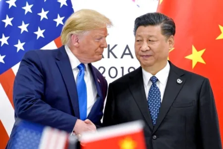 President Donald Trump shakes hands with China’s President Xi Jinping during a meeting on the sidelines of the G-20 summit in Osaka, Japan, June 29, 2019 (Picture: AP)
