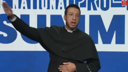 Calvin Robinson said he was mocking the outrage at Tesla CEO Elon Musk performing what has been described as a ‘Nazi salute’ (Picture: @RightWingWatch/X)