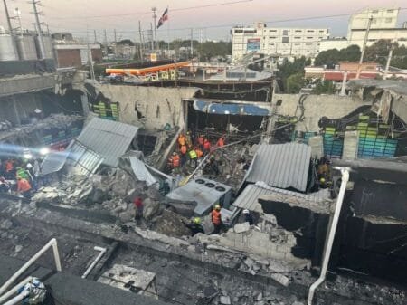 Concertgoers were packed into Santo Domingo’s Jet Set nightclub for a gig (Picture: Noticias SIN via AP)