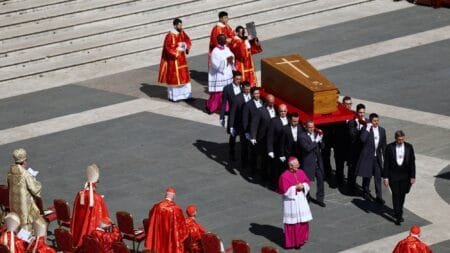 The coffin of Pope Francis is borne aloft by pallbearers. Pic: Reuters