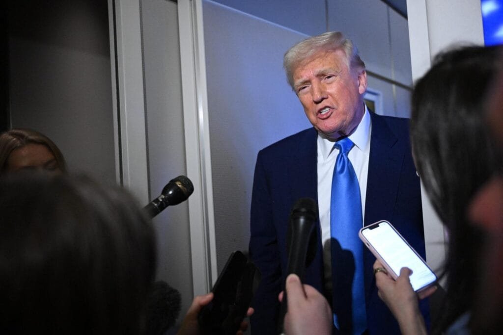 Trump speaks to reporters while in flight on Air Force One, en route to Joint Base Andrews on April 6, 2025.AFP via Getty Images