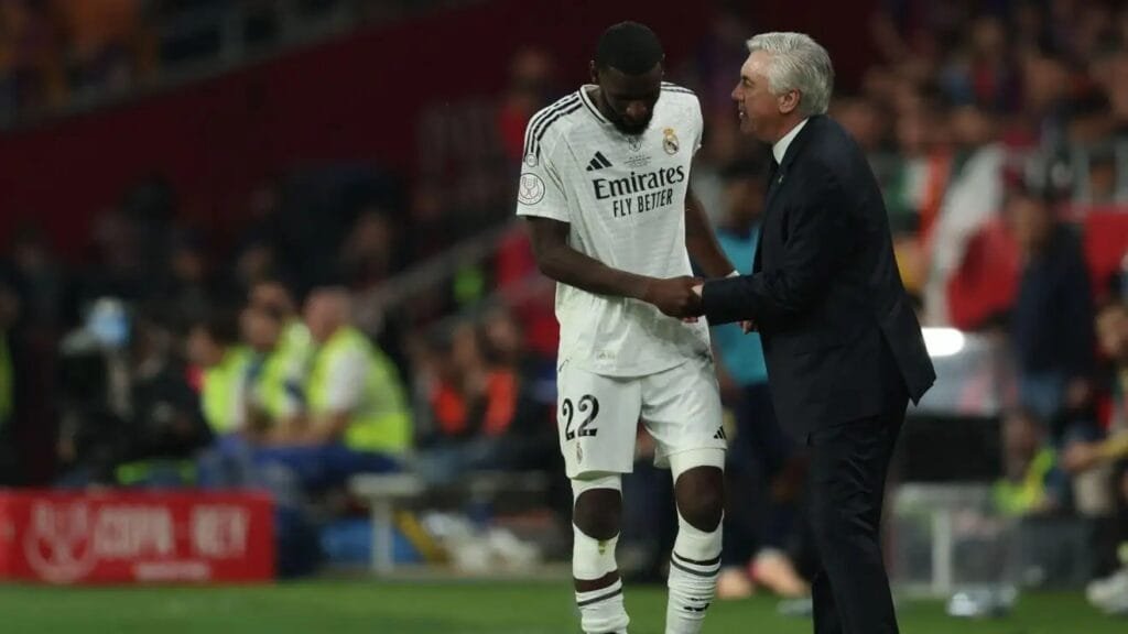 Antonio Rudiger talks to Carlo Ancelotti during the Copa del Rey final.