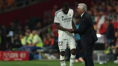 Antonio Rudiger talks to Carlo Ancelotti during the Copa del Rey final.