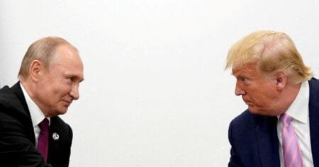 U.S. President Donald Trump and Russian President Vladimir Putin hold a bilateral meeting at the G20 leaders summit in Osaka, Japan June 28, 2019. REUTERS/Kevin Lamarque/File Photo